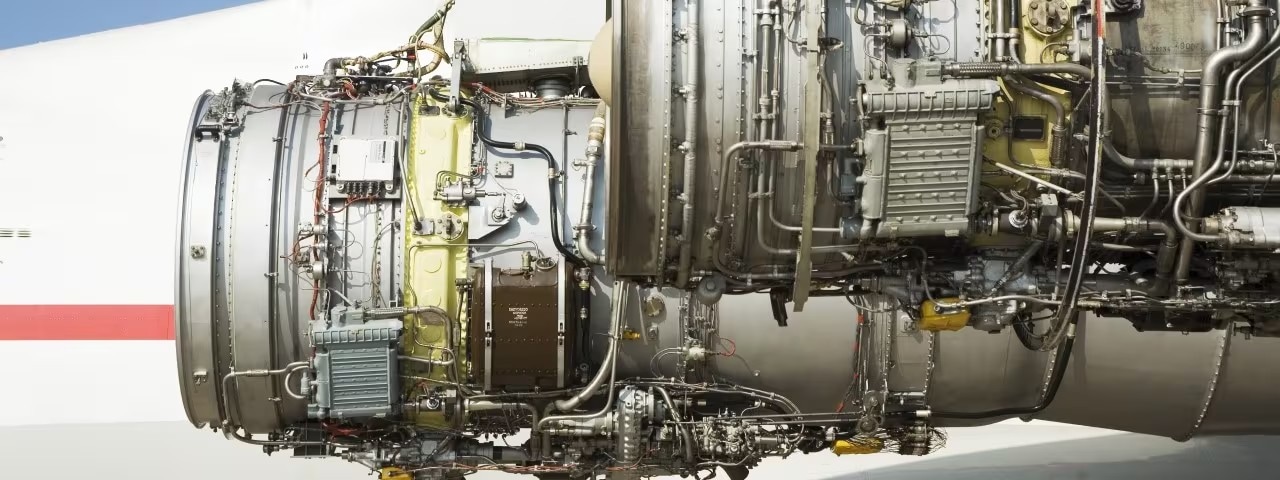 A view of an exposed jet engine.