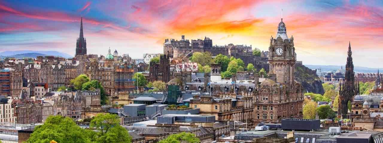 A view of Edinburgh’s skyline at sunset. 