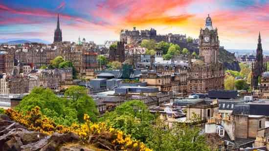 A view of Edinburgh’s skyline at sunset. 