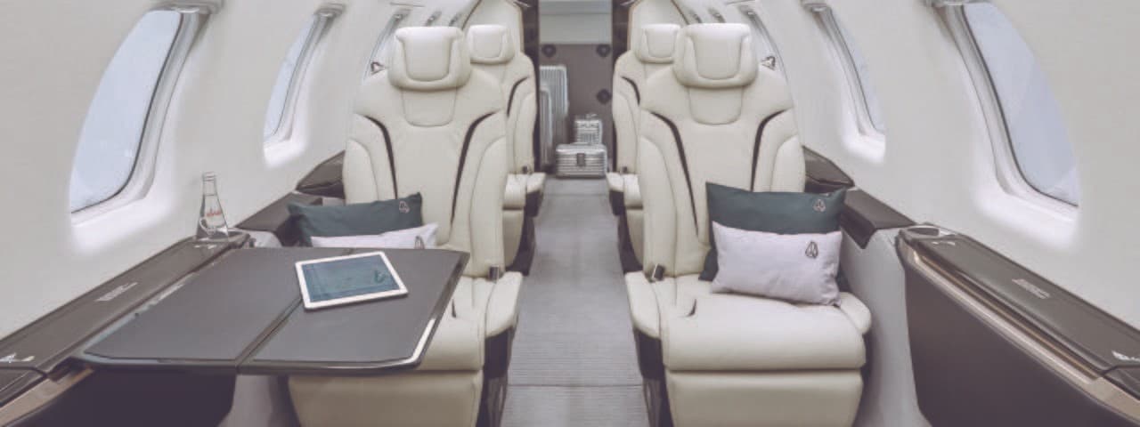 An white leather interior of a Pilatus PC-24