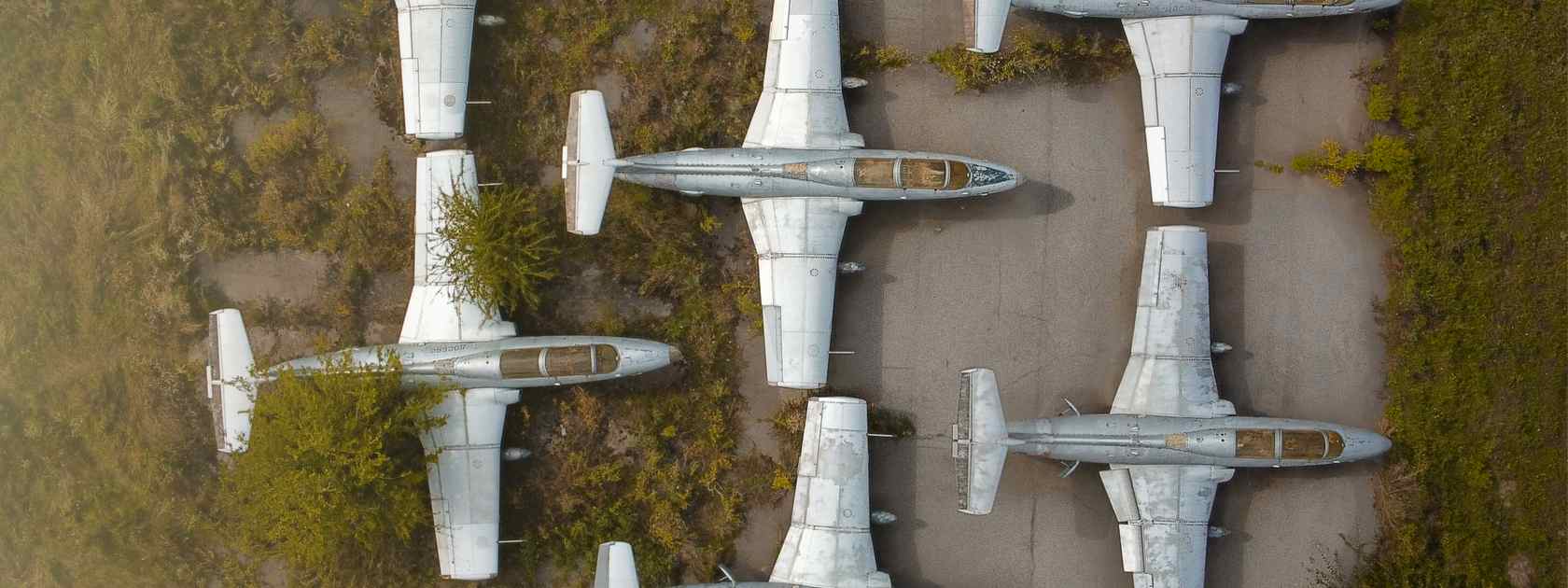 A top view of old rusty airplanes. 