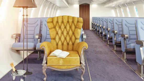 The luxury yellow armchairs in the private jet