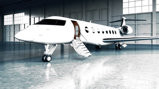 White jet in a hangar