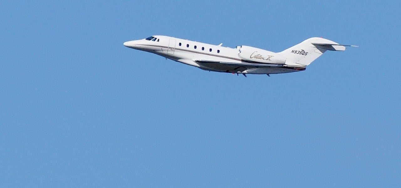 The Cessna Citation X in a blue cloudless sky