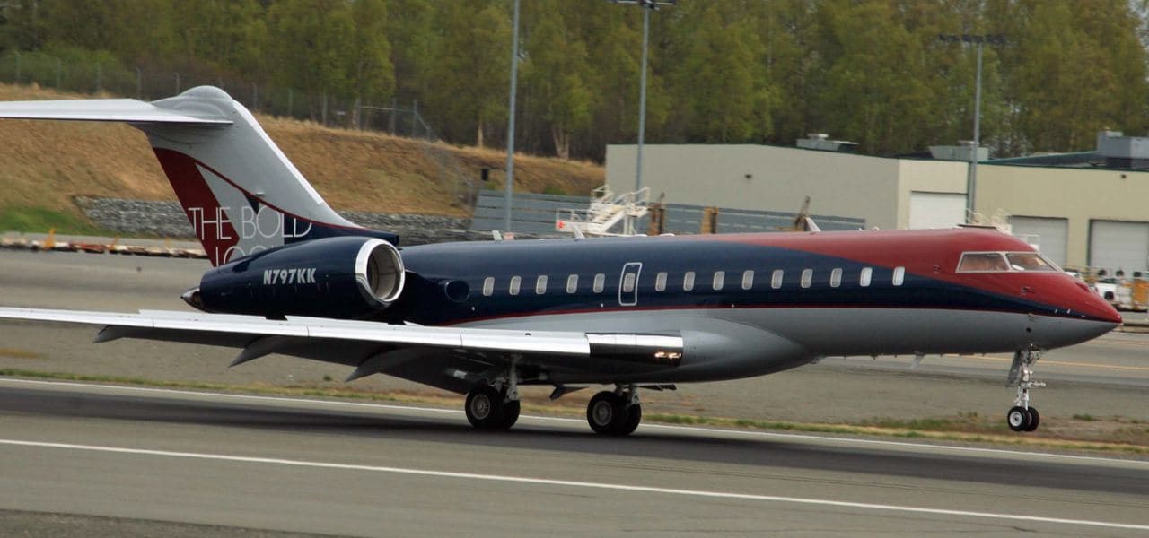 The Bold Look branded private jet landing at airport