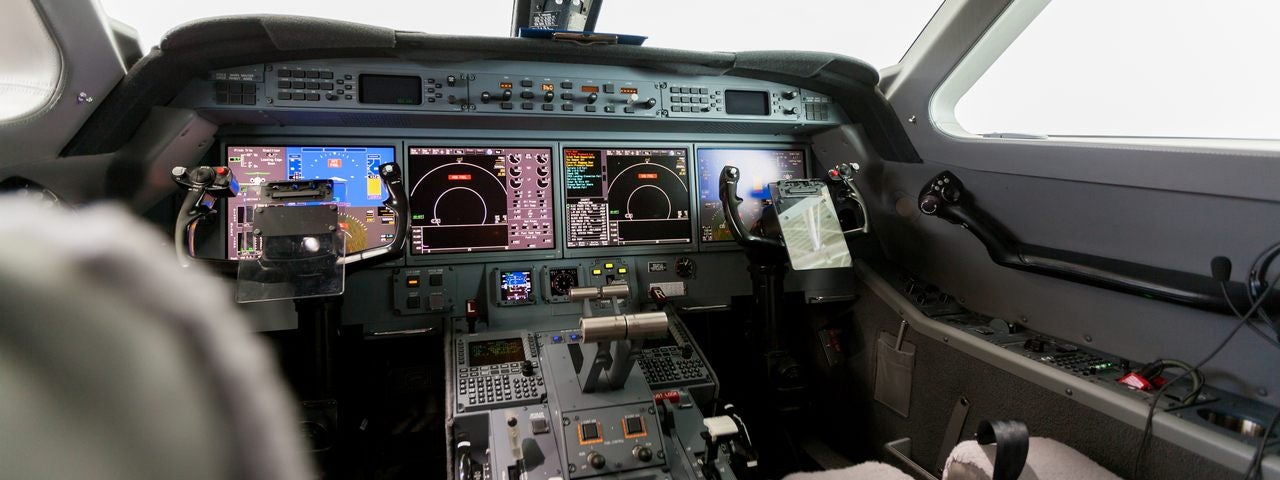  The cockpit of a private jet.