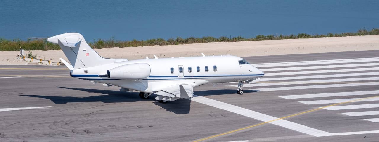 A private jet taxi (air taxi) on a runway.