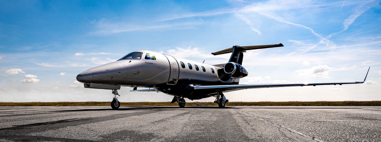 Private jet on a foggy runway