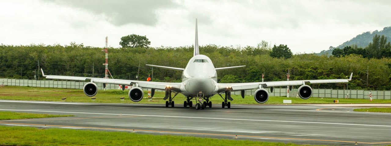 Boeing 747-400 preparing for take off on runway