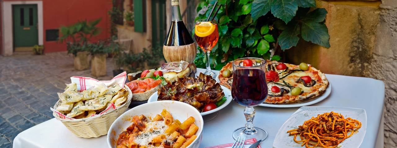 Traditional Italian food at an outdoor restaurant.