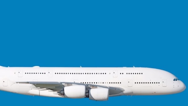 Largest modern heavy wide-body passenger jet engine on blue background
