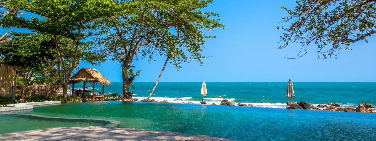 A swimming pool near the beach at a luxury resort in Koh Samui.