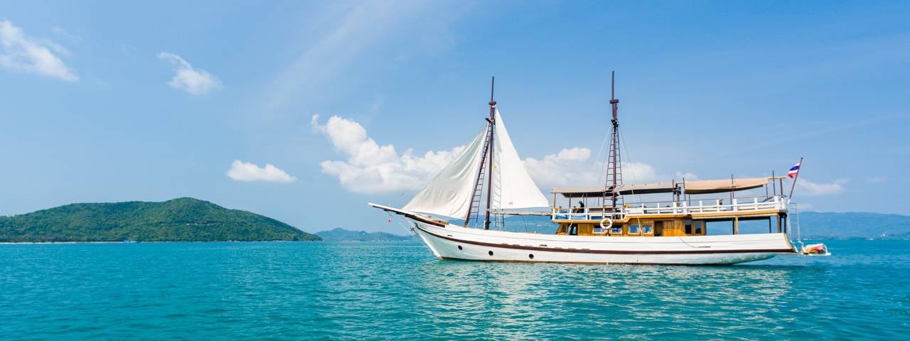 A sailboat on the water near Koh Samui island.