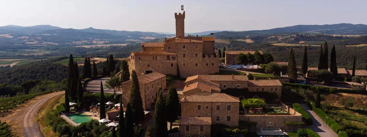 Castle Hotel Resort surrounded by Tuscan mountains