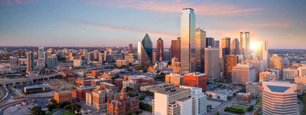 An aerial view of Dallas’ skyline at sunset.