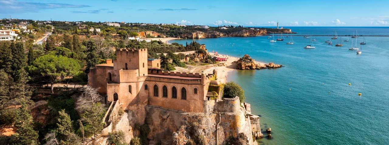 A fortress on a cliff overlooking the ocean in the Algarve.