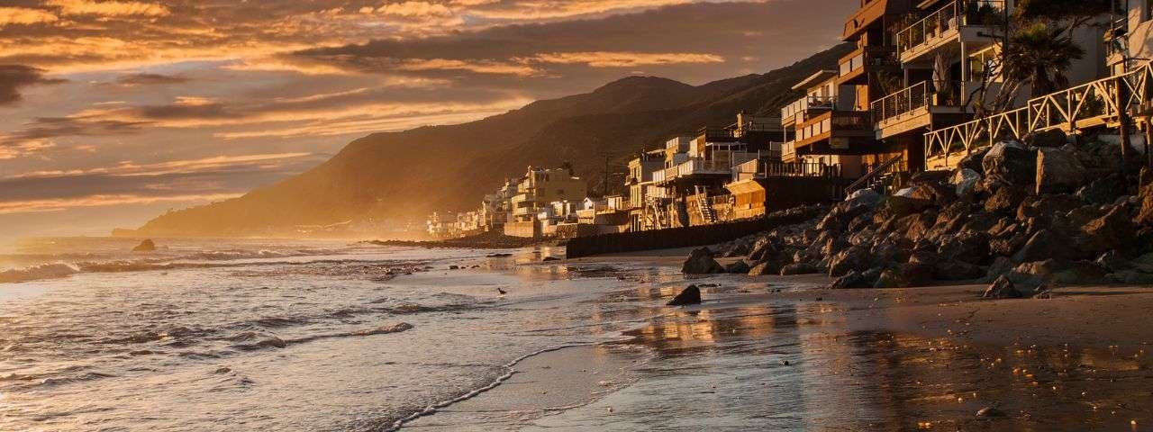 Sunset view of Topanga Beach in scenic Malibu, California.