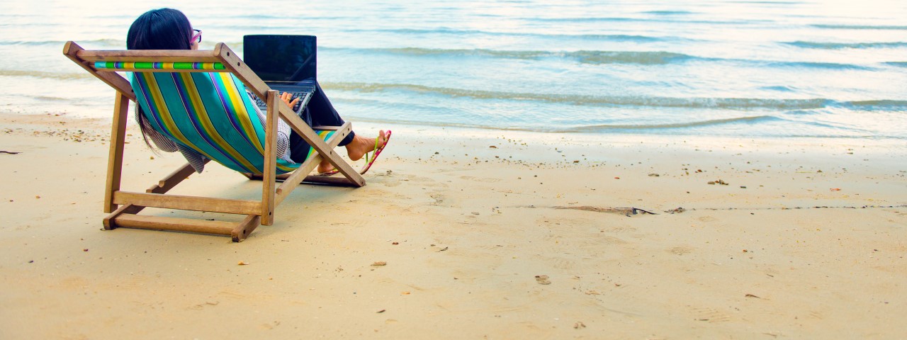 A woman on a beach chair
