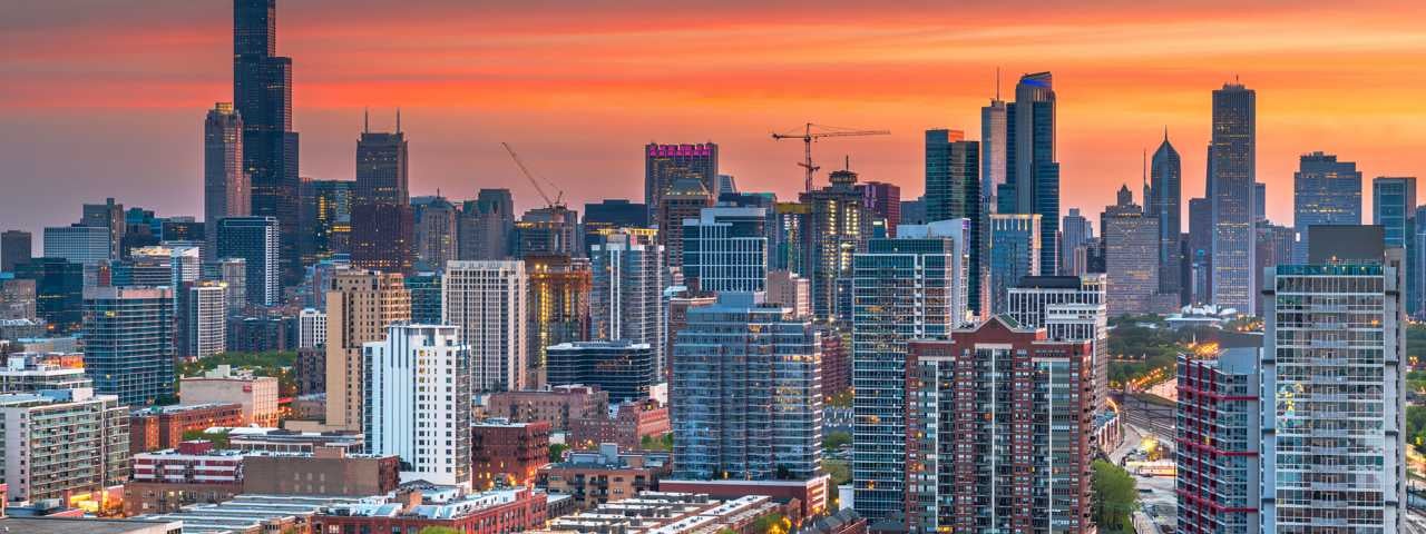 A chef putting the final touches on a plate of fine dining food. A chef putting the final touches on a plate of fine dining food.