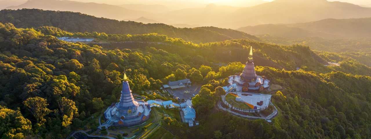 Sunset from the Doi Suthep temple in Chiang Mai surrounded by mountains