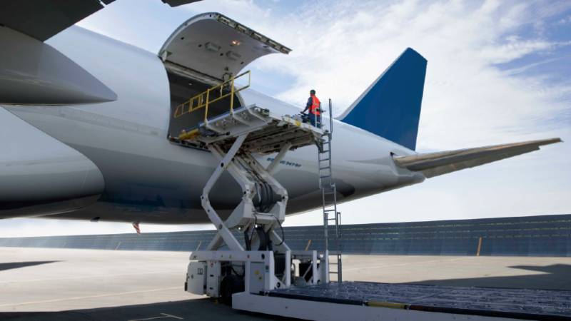 Cargo being loaded onto a plane.